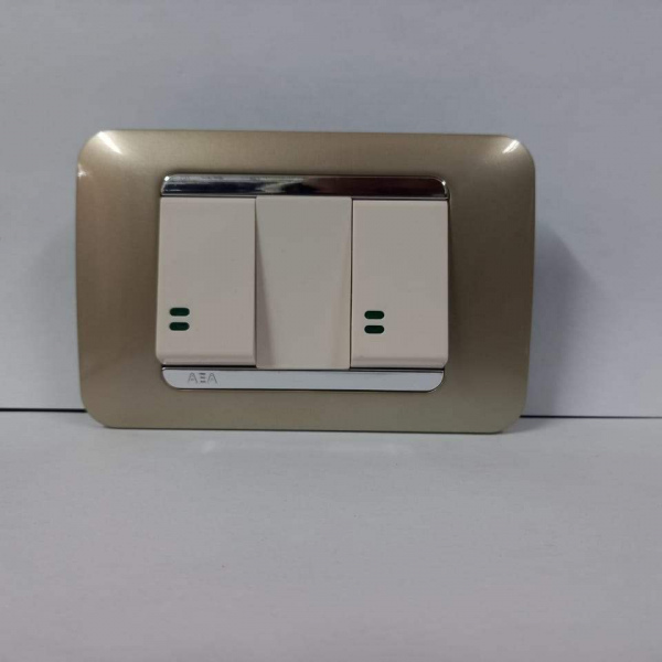 INTERRUPTOR DOBLE BEIGE DUET PLACA ORO RIBETE PLATA