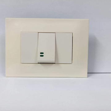 INTERRUPTOR 3 VIAS BEIGE SILUM PLACA BLANCA.